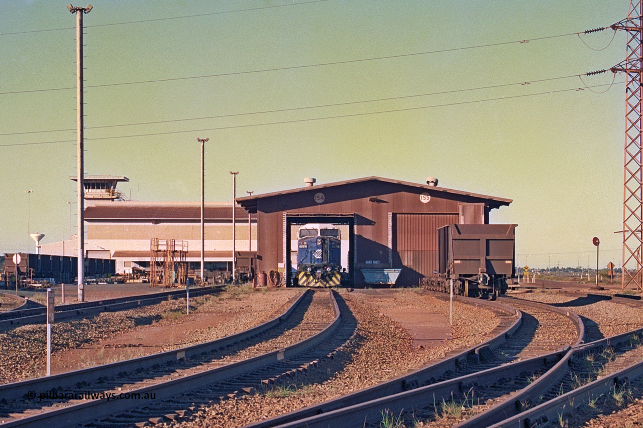 258-33
Nelson Point, Wheel Lathe shop with Ore Car Repair Shop and Yard Control behind it. General Electric built AC6000 locomotive 6074 'Kalgan' is out the front. Early May 2002.
Keywords: 6074;GE;AC6000;51066;