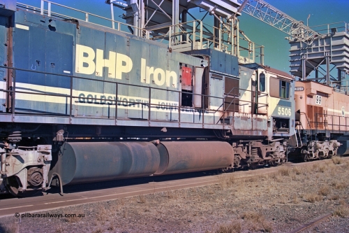 258-16
Nelson Point, old Loc Prep. Goninan GE rebuild C36-7M unit 5506 serial 4839-01 / 87-071 is waiting to be removed from site bound for Asset Kinetics in Maddington, Perth. Drivers cab side view. 5506 was rebuilt from NSW AE Goodwin built C636 ALCo number 5455 serial G6012-04 and was delivered in Mt Newman orange livery and originally named 'Mt Whaleback', after repainting into BHP blue was named 'Ethel Creek', then finally 'Mt Goldsworthy'. May 2002.
Keywords: 5506;Goninan;GE;C36-7M;4839-01/87-071;rebuild;AE-Goodwin;ALCo;C636;5455;G6012-4;