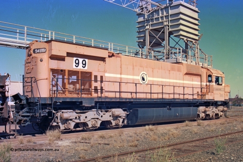 258-18
Nelson Point, old Loco Prep, Mt Newman Mining's last in-service ALCo M636 unit 5499 serial C6096-4 built by Comeng NSW sits awaiting partial dismantling before being sent by road to Rail Heritage WA's museum at Bassendean, Perth for preservation. May 2002.
Keywords: 5499;Comeng-NSW;MLW-ALCo;M636;C6096-4;