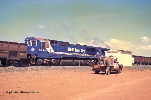 267-13
Goldsworthy Junction, BHP's 1230 empty departure trailing mid-train unit Goninan rebuild CM40-8M GE units 5645 'Sherlock' serial number 8281-11 / 92-134 104 waggons from the lead passes the Goldsworthy Junction relay room as Pope reads the newspaper. 1247 hrs Friday 12th of April 2002.
Keywords: 5645;Goninan;GE;CM40-8M;8281-11/92-134;rebuild;AE-Goodwin;ALCo;M636C;5475;G6047-7;