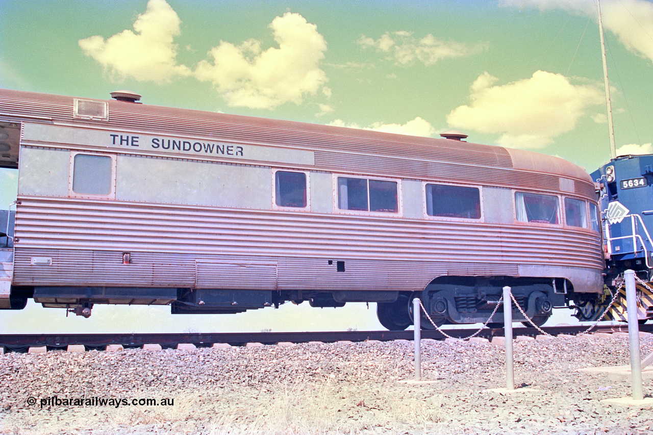 268-19
At the 39 km detection site with the Alstom 25-year special, the Sundowner coach, originally built by E. G. Budd in 1939 numbered 301 as the Silver Star, a diner-parlour-observation coach on the Chicago, Burlington and Quincy Railroad's General Pershing Zephyr train from the 1930s and 1940s. Donated to Mt Newman Mining Co. by AMAX an original joint venture partner to commemorate the projects first 100 million tonnes of iron ore railed between Mount Whaleback mine and the Port Hedland port. 12th of April 2002.
Keywords: Silver-Star;EG-Budd;Sundowner;General-Pershing-Zephyr;301;