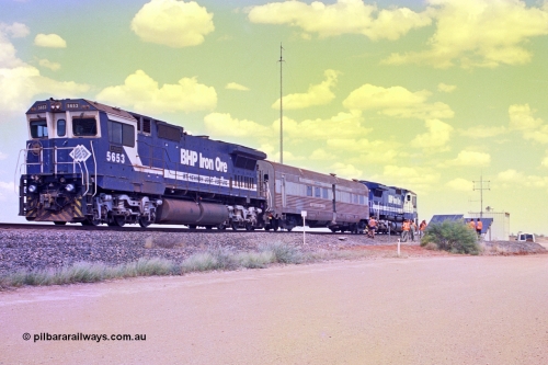 268-02
At the 39 km detection site with the Alstom 25-year service agreement special, BHP Iron Ore's Goninan GE rebuild CM40-8M unit 5653 'Chiba' serial number 8412-10 / 93-144 stands on the Newman mainline with The Sundowner and 5634 on the rear of the train as the party conducts an inspection of the site. Friday 12th of April 2002.
Keywords: 5653;Goninan;GE;CM40-8M;8412-10/93-144;rebuild;AE-Goodwin;ALCo;M636C;5484;G6061-5;