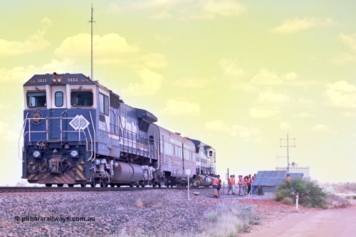 268-05
At the 39 km detection site with the Alstom 25-year service agreement special, BHP Iron Ore's Goninan GE rebuild CM40-8M unit 5653 'Chiba' serial number 8412-10 / 93-144 stands on the Newman mainline with The Sundowner and 5634 on the rear of the train as the party conducts an inspection of the site. Friday 12th of April 2002.
Keywords: 5653;Goninan;GE;CM40-8M;8412-10/93-144;rebuild;AE-Goodwin;ALCo;M636C;5484;G6061-5;
