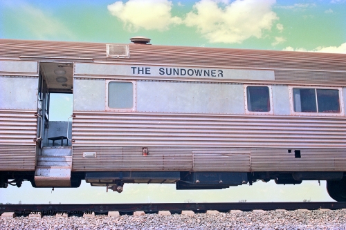 268-18
At the 39 km detection site with the Alstom 25-year special, the Sundowner coach, originally built by E. G. Budd in 1939 numbered 301 as the Silver Star, a diner-parlour-observation coach on the Chicago, Burlington and Quincy Railroad's General Pershing Zephyr train from the 1930s and 1940s. Donated to Mt Newman Mining Co. by AMAX an original joint venture partner to commemorate the projects first 100 million tonnes of iron ore railed between Mount Whaleback mine and the Port Hedland port. 12th of April 2002.
Keywords: Silver-Star;EG-Budd;Sundowner;General-Pershing-Zephyr;301;