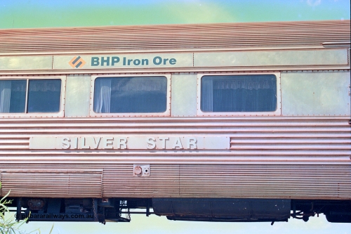 268-20
At the 39 km detection site with the Alstom 25-year special, the Sundowner coach, originally built by E. G. Budd in 1939 numbered 301 as the Silver Star, a diner-parlour-observation coach on the Chicago, Burlington and Quincy Railroad's General Pershing Zephyr train from the 1930s and 1940s. Donated to Mt Newman Mining Co. by AMAX an original joint venture partner to commemorate the projects first 100 million tonnes of iron ore railed between Mount Whaleback mine and the Port Hedland port. April 12, 2002.
Keywords: Silver-Star;EG-Budd;Sundowner;General-Pershing-Zephyr;301;