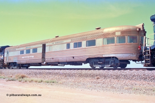 268-32
At the 39 km detection site with the Alstom 25-year special, view from the No. 2 End of the Sundowner coach, originally built by E. G. Budd in 1939 numbered 301 as the Silver Star, a diner-parlour-observation coach on the Chicago, Burlington and Quincy Railroad's General Pershing Zephyr train from the 1930s and 1940s. Donated to Mt Newman Mining Co. by AMAX an original joint venture partner to commemorate the projects first 100 million tonnes of iron ore railed between Mount Whaleback mine and the Port Hedland port. 12th of April 2002.
Keywords: Silver-Star;EG-Budd;Sundowner;General-Pershing-Zephyr;301;