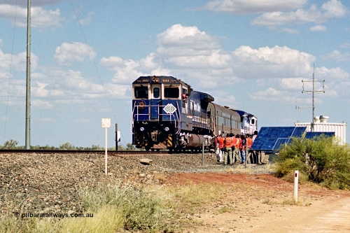 269-02
At the 39 km detection site with the Alstom 25-year service agreement special, BHP Iron Ore's Goninan GE rebuild CM40-8M unit 5653 'Chiba' serial number 8412-10 / 93-144 stands on the Newman mainline with The Sundowner and 5634 on the rear of the train as the party conducts an inspection of the site. Friday 12th of April 2002.
Keywords: 5653;Goninan;GE;CM40-8M;8412-10/93-144;rebuild;AE-Goodwin;ALCo;M636C;5484;G6061-5;