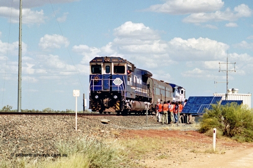 269-03
At the 39 km detection site with the Alstom 25-year service agreement special, BHP Iron Ore's Goninan GE rebuild CM40-8M unit 5653 'Chiba' serial number 8412-10 / 93-144 stands on the Newman mainline with The Sundowner and 5634 on the rear of the train as the party conducts an inspection of the site. Friday 12th of April 2002.
Keywords: 5653;Goninan;GE;CM40-8M;8412-10/93-144;rebuild;AE-Goodwin;ALCo;M636C;5484;G6061-5;
