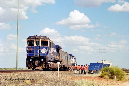269-05
At the 39 km detection site with the Alstom 25-year service agreement special, BHP Iron Ore's Goninan GE rebuild CM40-8M unit 5653 'Chiba' serial number 8412-10 / 93-144 stands on the Newman mainline with The Sundowner and 5634 on the rear of the train as the party conducts an inspection of the site. Friday 12th of April 2002.
Keywords: 5653;Goninan;GE;CM40-8M;8412-10/93-144;rebuild;AE-Goodwin;ALCo;M636C;5484;G6061-5;
