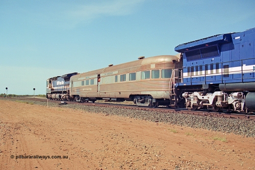 269-25
Goldsworthy Junction, and the Alstom 25-year service agreement special led by BHP Iron Ore's Goninan GE rebuild CM40-8M unit 5653 'Chiba' serial number 8412-10 / 93-144 heads back to Nelson Point with The Sundowner and 5634 on the rear of the train. Friday 12th of April 2002.
Keywords: Silver-Star;EG-Budd;Sundowner;General-Pershing-Zephyr;301;