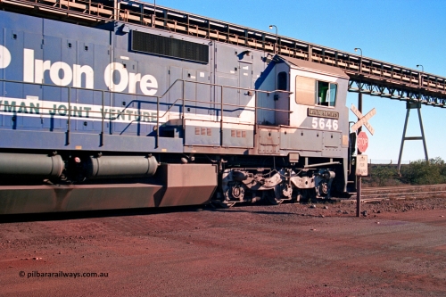 275-23
Finucane Island, BHP Iron Ore's CM40-8 locomotive 5646 'White Springs' arrives at the island. The elevated conveyor is for the HBI plant. August 10, 2003.
Keywords: 5646;Goninan;GE;CM40-8;8244-11/92-135;