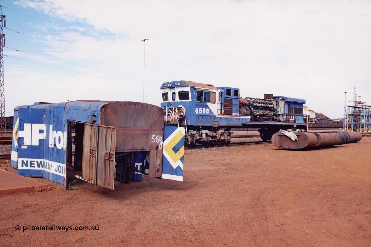 283-07
Nelson Point, BHP 's retired Goninan ALCo to GE rebuild C36-7M unit 5508 serial number 4839-04 / 87-073 is being prepared for road transport to Goninan in Perth. It will go on to be rebuilt and leased to Rio Tinto as 5052. May 2002.
Keywords: 5508;Goninan;GE;C36-7M;4839-04/87-073;rebuild;AE-Goodwin;ALCo;C636;5466;G6041-2;
