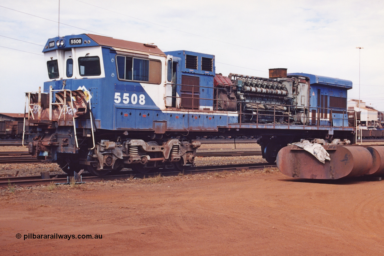 283-09
Nelson Point, BHP 's retired Goninan ALCo to GE rebuild C36-7M unit 5508 serial number 4839-04 / 87-073 is being prepared for road transport to Goninan in Perth. It will go on to be rebuilt and leased to Rio Tinto as 5052. May 2002.
Keywords: 5508;Goninan;GE;C36-7M;4839-04/87-073;rebuild;AE-Goodwin;ALCo;C636;5466;G6041-2;