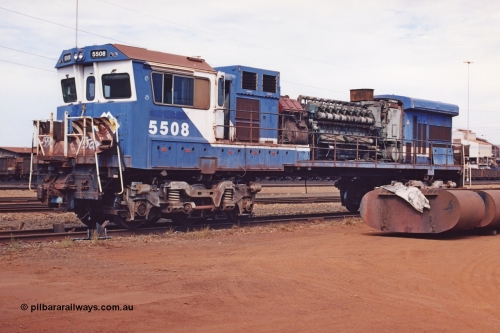283-09
Nelson Point, BHP 's retired Goninan ALCo to GE rebuild C36-7M unit 5508 serial number 4839-04 / 87-073 is being prepared for road transport to Goninan in Perth. It will go on to be rebuilt and leased to Rio Tinto as 5052. May 2002.
Keywords: 5508;Goninan;GE;C36-7M;4839-04/87-073;rebuild;AE-Goodwin;ALCo;C636;5466;G6041-2;