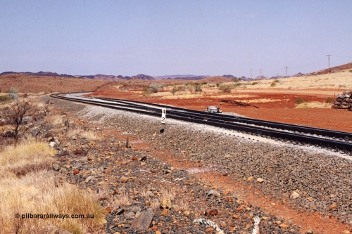 283-12
Harding Siding on the Robe River line at the 42 kilometre post looking in the down direction towards Deepdale. Recently extended north end of the siding to accommodate the soon to be West Angelas traffic and longer trains. 22nd of May 2002.
