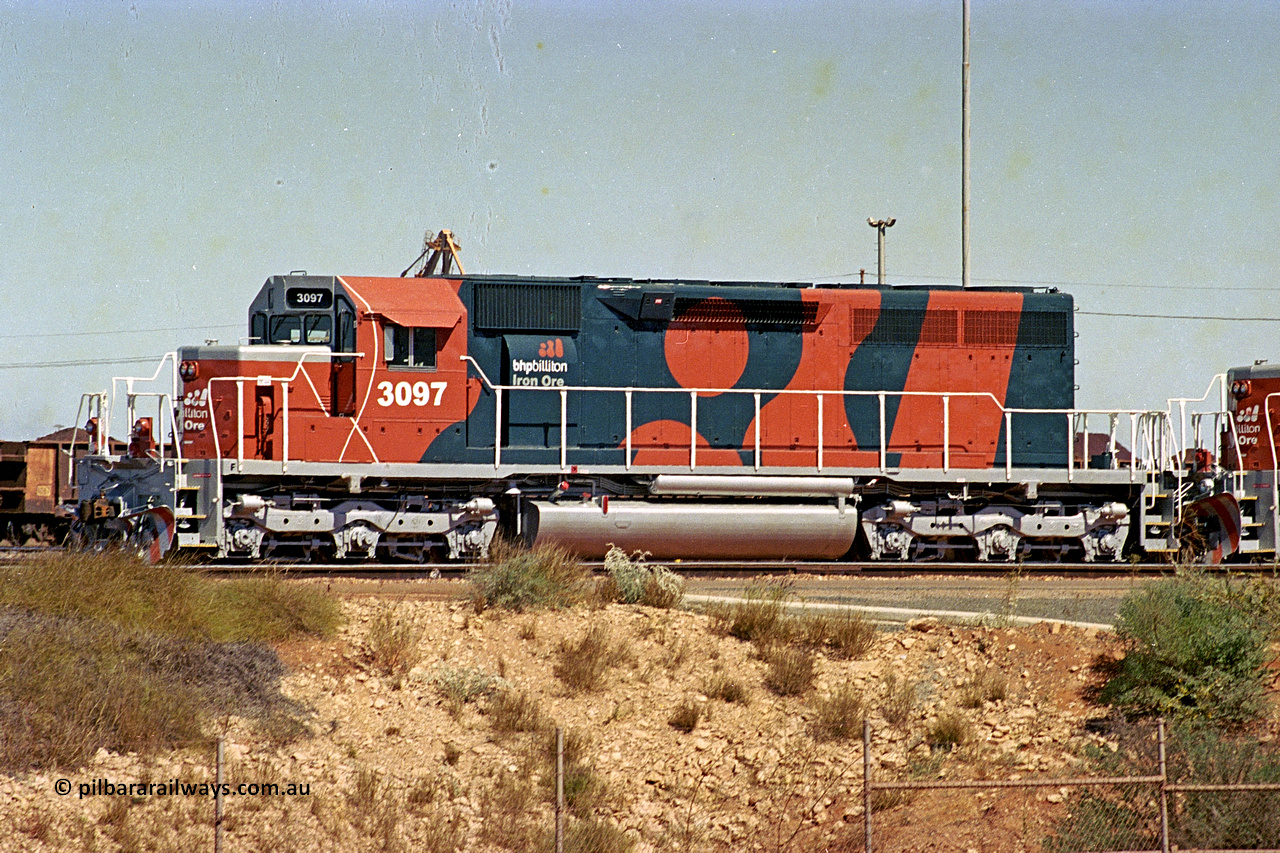 284-01
Port Hedland, Nelson Point hard stand area, BHP Billiton EMD SD40R unit 3097 serial 31569 and originally Southern Pacific SD40 SP 8409 is the final member of the SD40 units and has just been unloaded, August 7, 2004.
Keywords: 3097;EMD;SD40R;31569/7875-10;SD40;SP8409;