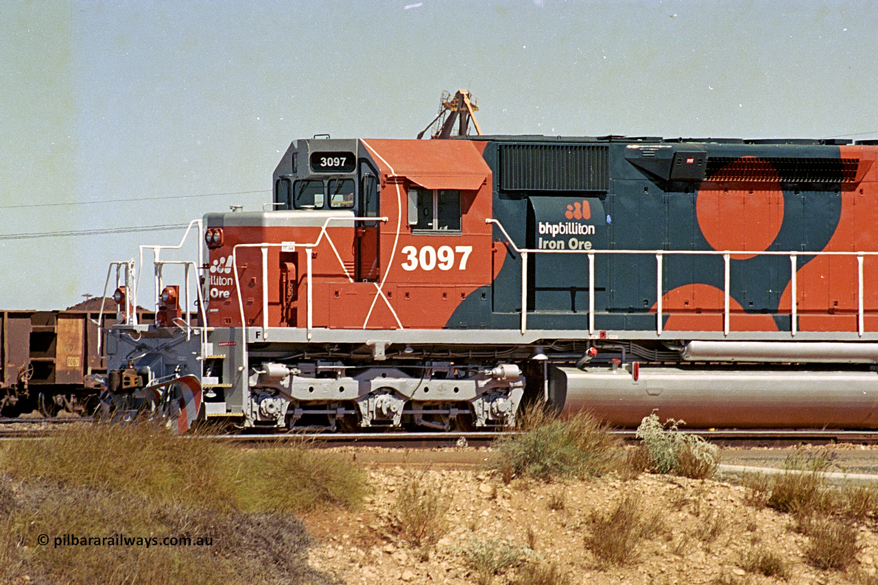 284-02
Port Hedland, Nelson Point hard stand area, BHP Billiton EMD SD40R unit 3097 serial 31569 and originally Southern Pacific SD40 SP 8409 is the final member of the SD40 units and has just been unloaded, August 7, 2004.
Keywords: 3097;EMD;SD40R;31569/7875-10;SD40;SP8409;