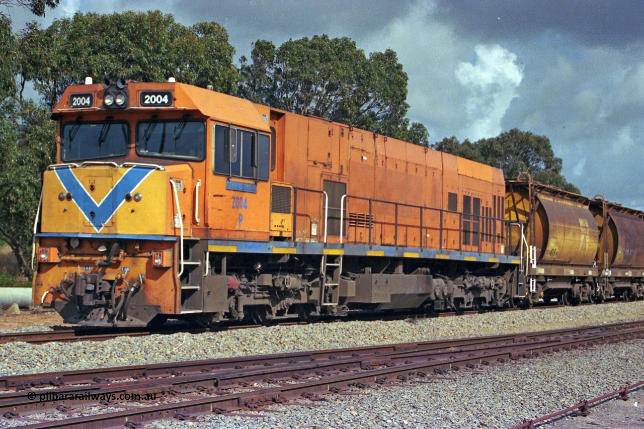 284-16
Narngulu, Geraldton, former Westrail P class loco P 2004 'Shire of Dalwallinu' built by Goninan WA as a GE CM25-8 model with serial number 6320-12 / 90-099 sits in the yard on empty mineral sand train waiting to run to Eneabba. November 9, 2004.
Keywords: P-class;P2004;Goninan-WA;GE;CM25-8;6320-03/90-089;