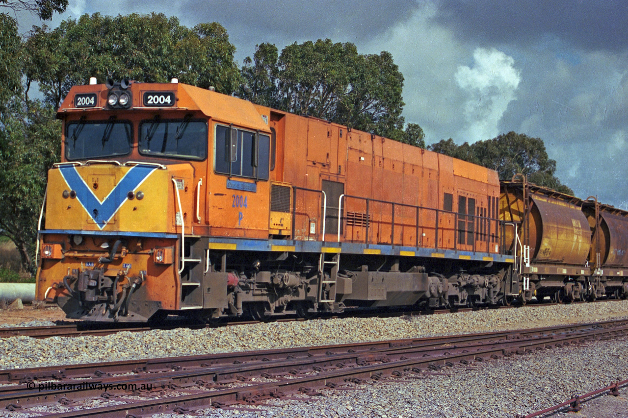 284-17
Narngulu, Geraldton, former Westrail P class loco P 2004 'Shire of Dalwallinu' built by Goninan WA as a GE CM25-8 model with serial number 6320-12 / 90-099 sits in the yard on empty mineral sand train waiting to run to Eneabba. November 9, 2004.
Keywords: P-class;P2004;Goninan-WA;GE;CM25-8;6320-03/90-089;