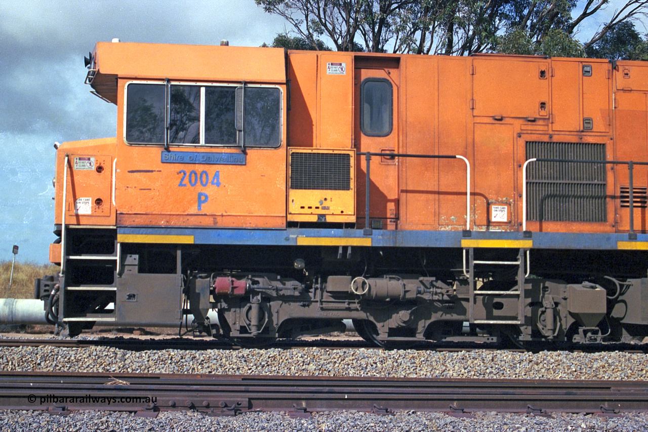 284-20
Narngulu, Geraldton, former Westrail P class loco P 2004 'Shire of Dalwallinu' built by Goninan WA as a GE CM25-8 model with serial number 6320-12 / 90-099 sits in the yard on empty mineral sand train waiting to run to Eneabba. November 9, 2004.
Keywords: P-class;P2004;Goninan-WA;GE;CM25-8;6320-03/90-089;