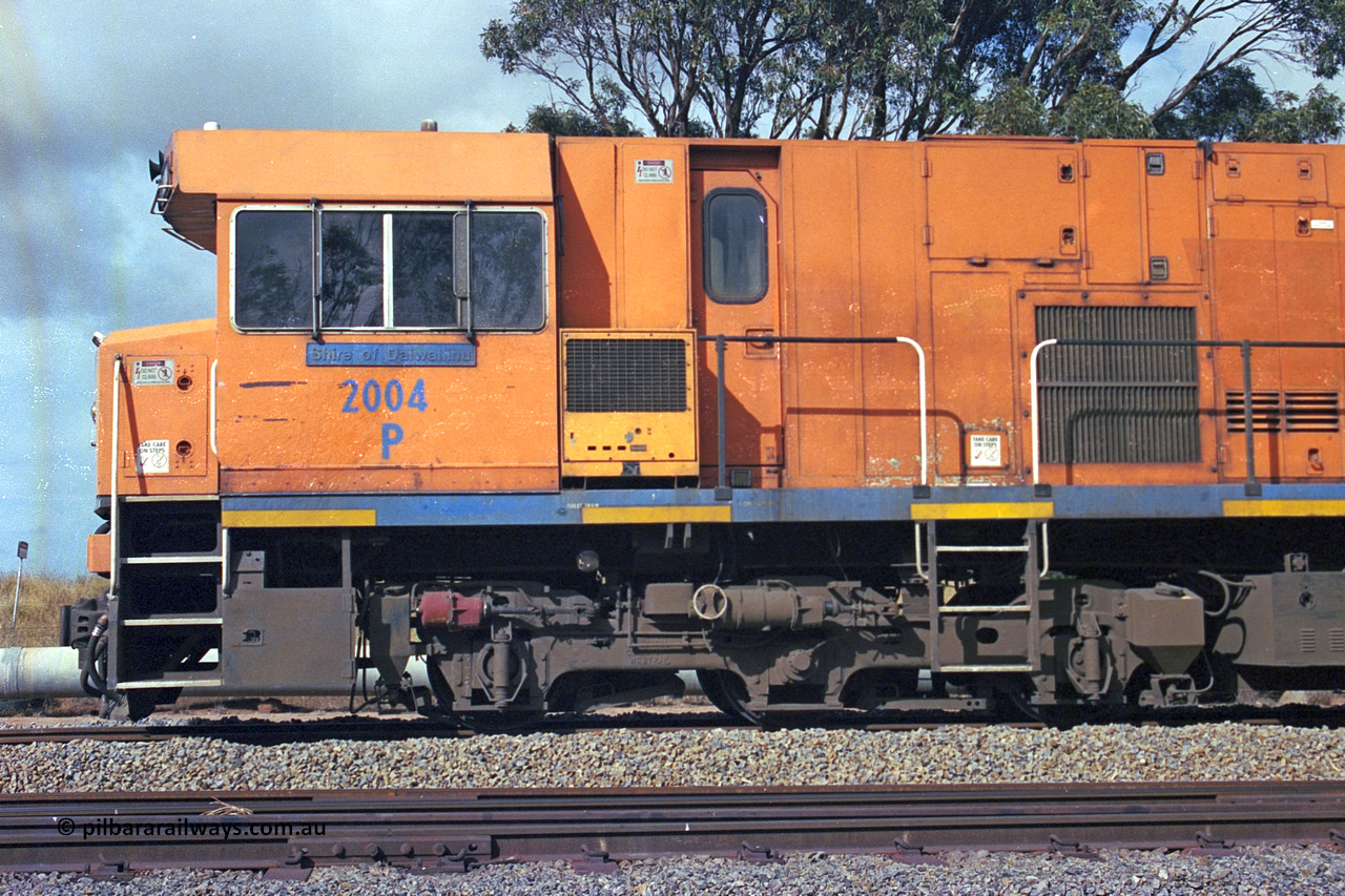 284-22
Narngulu, Geraldton, former Westrail P class loco P 2004 'Shire of Dalwallinu' built by Goninan WA as a GE CM25-8 model with serial number 6320-12 / 90-099 sits in the yard on empty mineral sand train waiting to run to Eneabba. November 9, 2004.
Keywords: P-class;P2004;Goninan-WA;GE;CM25-8;6320-03/90-089;