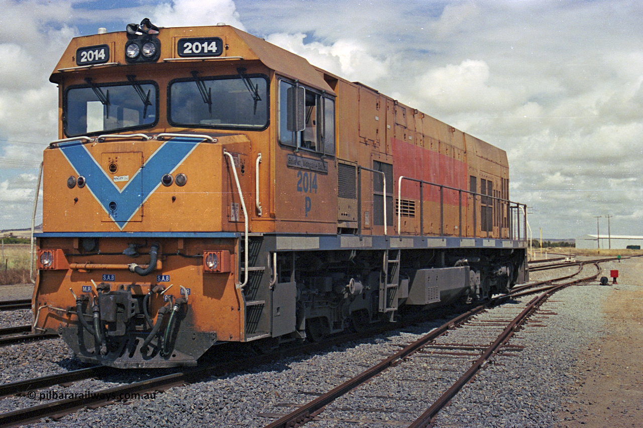 284-27
Narngulu, Geraldton, former Westrail P class loco P 2014 'Shire of Wongan-Ballidu' built by Goninan WA as a GE CM25-8 model with serial number 6320-12 / 90-099 sits in the yard in-between shunt movements. November 10, 2004.
Keywords: P-class;P2014;Goninan-WA;GE;CM25-8;6320-12/90-099;