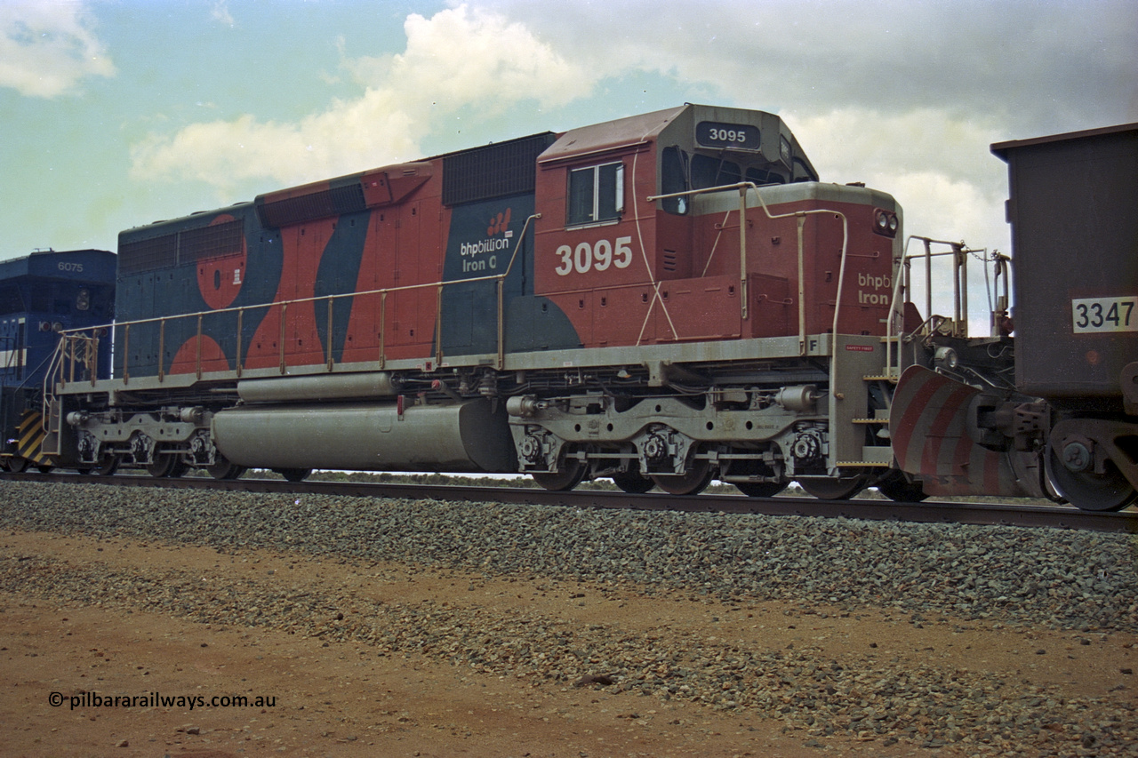 284-29
Bing Siding, 18 km south of Nelson Point with a loaded train holding the mainline with newly delivered BHP Billiton EMD SD40R unit 3095 serial 33677 as the second unit behind an AC6000. Late 2004.
Keywords: 3095;EMD;SD40R;33677/7083-7;SD40;SP8485;