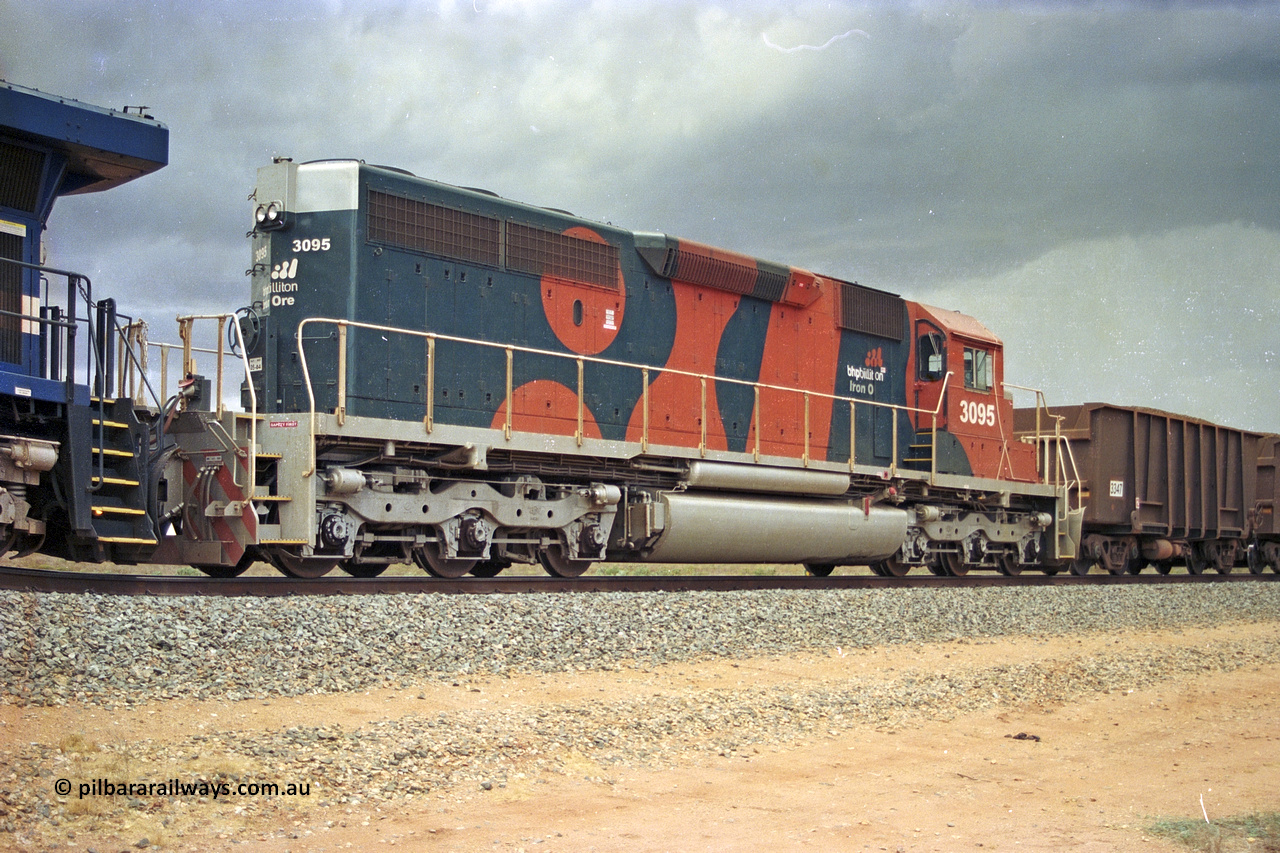 284-30
Bing Siding, 18 km south of Nelson Point with a loaded train holding the mainline with newly delivered BHP Billiton EMD SD40R unit 3095 serial 33677 as the second unit behind an AC6000. Late 2004.
Keywords: 3095;EMD;SD40R;33677/7083-7;SD40;SP8485;