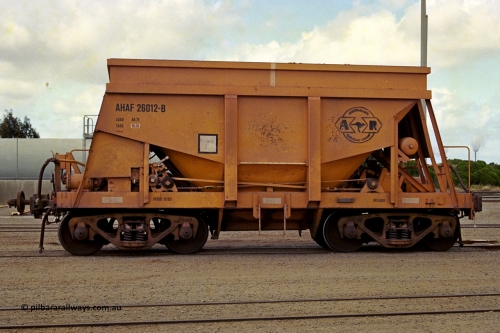 284-04
Narngulu, Geraldton, AHAF type iron ore waggon AHAF 26012 sits in the yard. One of twenty Kinki Sharyo Ltd of Japan built NHA type iron ore waggon for the North Australia line in 1968 that made it to WA under Aurizon for iron ore traffic on the narrow gauge. November 8, 2004.
Keywords: AHAF-type;AHAF26012;Kinki-Sharyo-Ltd-Japan;NHA-type;