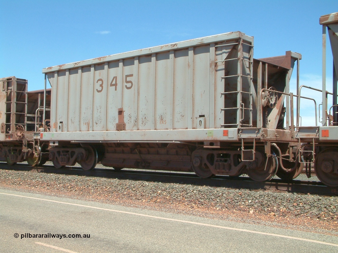 040409 123128
Boodarie, Goldsworthy service bottom discharge Portec USA built ore waggon 345 is one of ten that was purchased second hand in 1992 from Phelps Dodge Copper Mine, believed to be built in 1980s. 9th April 2004.
Keywords: 345;Portec-USA;BHP-ore-waggon;