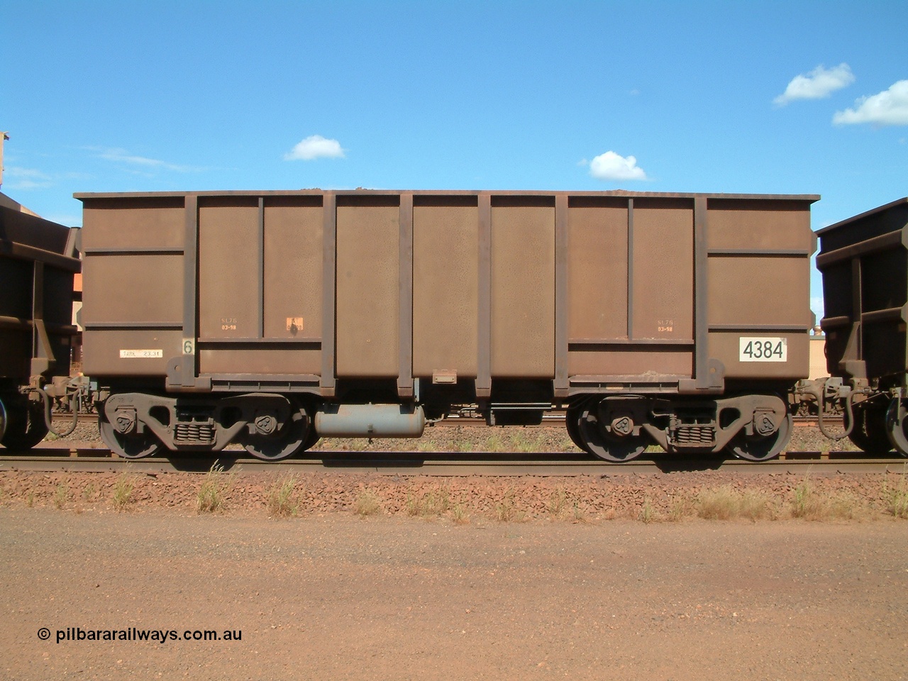 040412 143234
Nelson Point, a Goninan built ore waggon 4384, one of 126 such waggons constructed during 1997 out of 3CR12 stainless steel in an effort to eliminate painting and to reduce wear on the waggon body. Note the rounded bottom edge and tapered floor, this design was designated HC7081. 12th April 2004.
Keywords: 4384;Goninan-WA;BHP-ore-waggon;