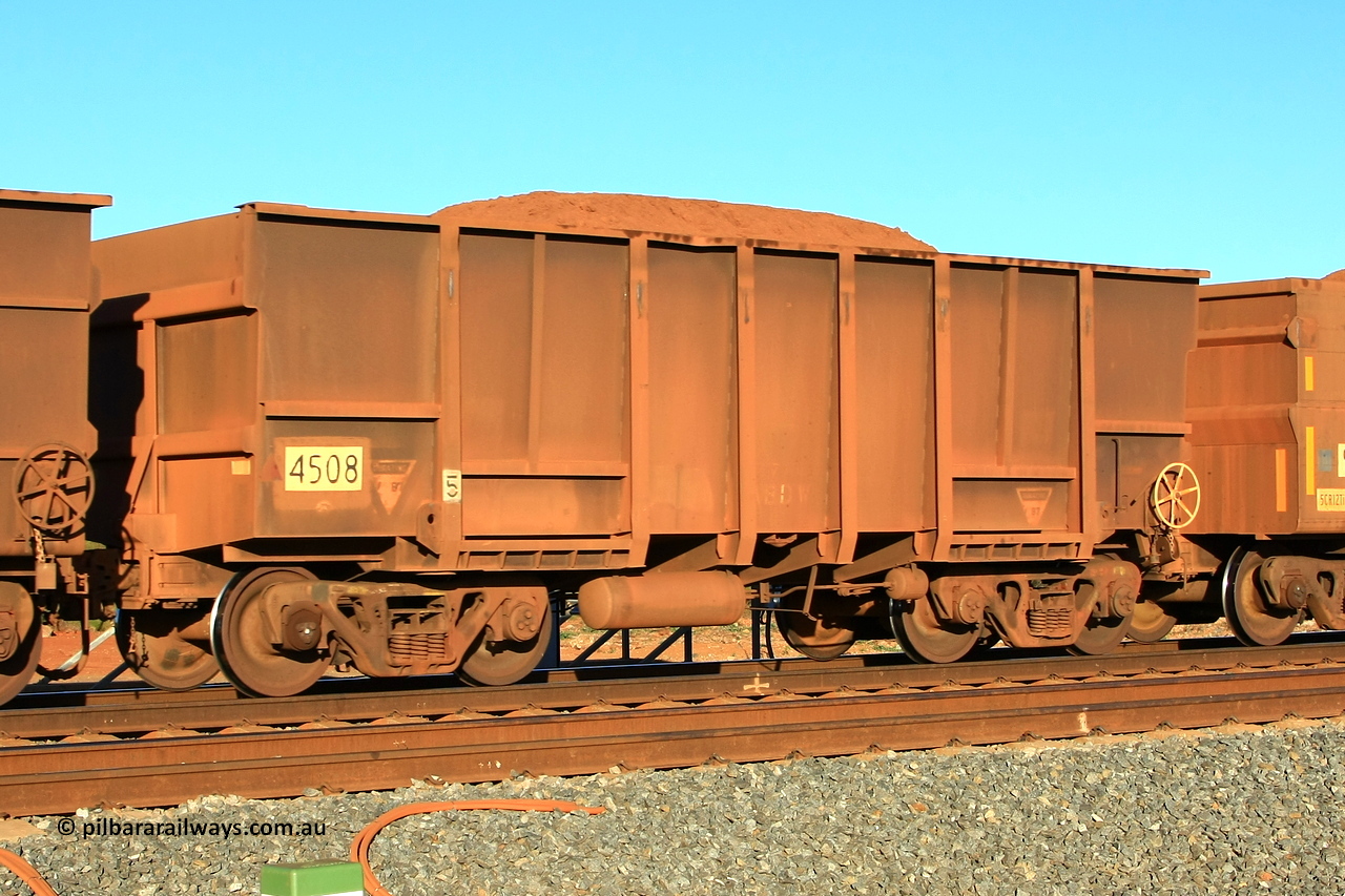 110620 2320r
Walla, loaded BHP ore waggon 4508, one of eighteen built by Transfield WA in 1976 with a tapered floor. 20th of June 2011.
Keywords: 4508;Transfield-WA;BHP-ore-waggon;