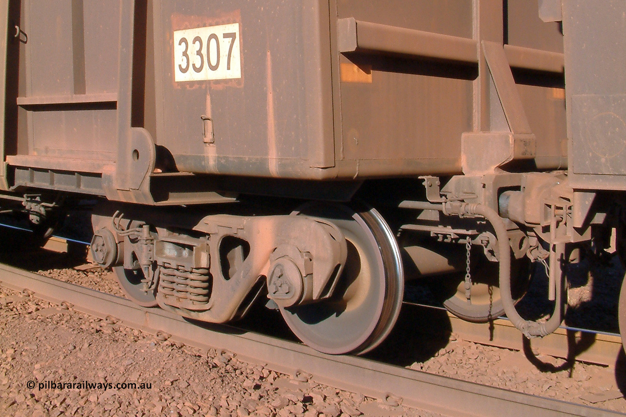 3307 Astra Vagoane 040804 155658
Nelson Point, detail view of rounded corner, pushing horn, coupler and bogie of BHP ore waggon 3307 is one of three hundred and fifty waggons built during 1988 by Astra Vagoane of Arad in Romania for Lang Hancock as part of a 'waggons for iron ore arrangement' with the then Romanian government, however only seventy-five found their way into service with BHP. August 4, 2004.
Keywords: 3307;Astra-Vagoane-Arad-Romania;BHP-ore-waggon;