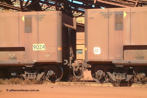 9024 Comeng 030712 143247
Nelson Point, empty BHP ore waggon 9024, originally built by Comeng in Mittagong NSW as a part of seven prototype ore waggons made from low carbon 301 stainless steel with an higher volume and aerodynamic flat sides and were bogieless with four independent radial wheel sets. Of the seven waggon, the first four had a flat floor and final three had a drop belly floor. The radial wheel sets were later replaced with conventional bogies. This view shows the reduced gap between waggons reduced from 1084 to 934 mm to aid the aerodynamics. July 12, 2003.
Keywords: 9024;Comeng-NSW;BHP-ore-waggon;