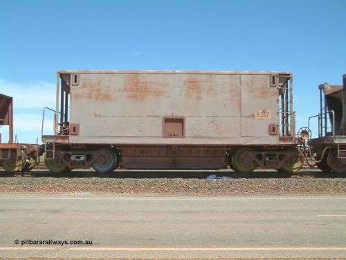 8317 Gunderson USA 040409 123014
Boodarie, Goldsworthy service bottom discharge Gunderson USA built ore waggon 8317 is one of forty five that was purchased second hand in 1992 from Phelps Dodge Copper Mine, believed to be built in 1970s. 9th April 2004.
Keywords: 8317;Gunderson-USA;BHP-ore-waggon;