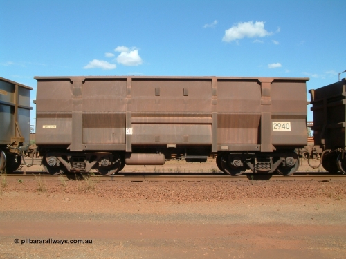 2940 Goninan 040412 143710
Nelson Point, Goninan built, Lynx Engineering designed ore waggon 2940 are known as Golynx waggons, one of 345 such waggons constructed during 2001 out of 3CR12 stainless steel in an effort to eliminate painting and to reduce wear on the waggon body. 12th April 2004.
Keywords: 2940;Goninan-WA;Golynx;BHP-ore-waggon;