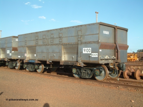 9100 Bradken 041225 064541
Nelson Point Ore Car Repair Shops, brand new Bradken NSW built ore waggon and type leader 9100 asset number 2031702 and 9101 behind it. These waggons are the latest additions to the fleet with 20 on order in total. They are made from the same 5Cr12Ti steel that the Goninan Golynx waggons are made. 9100 has been set up for use as a 'test' waggon with load sensors located all over it. 25th December 2004.
Keywords: 9100;Bradken-NSW;BHP-ore-waggon;