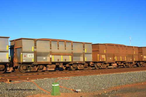 1418 Goninan 110620 2296
Walla, loaded BHP ore waggon 1418 is a Goninan WA build to the Golynx design as a replacement body from February 2011. This replaces the original Comeng WA waggon of the same number. June 20, 2011.
Keywords: 1418;Goninan-WA;Golynx;BHP-ore-waggon;