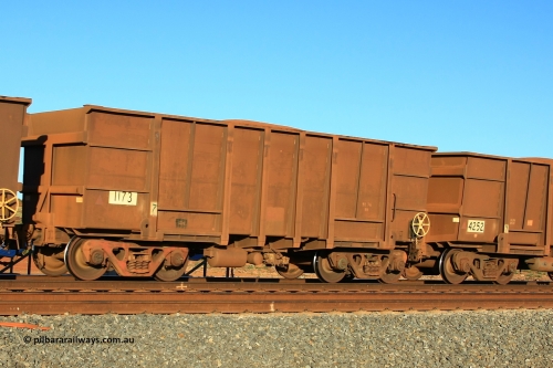 1173 Comeng 110620 2490
Walla, loaded BHP ore waggon 1173, whilst numbered and the ends and sill are from Comeng WA 1971 build of one hundred and eighty-three waggons, the side walls have been totally replaced with rounded bottoms and Goninan style extra ribs. June 20, 2011.
Keywords: 1173;Comeng-WA;BHP-ore-waggon;