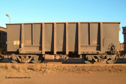 1317 Comeng 040815 165934
Nelson Point, Car Dumper 3, empty BHP Iron Ore waggon 1317, a Comeng WA build from batch of 226 built between 1973-74, looks to have been partially resheeted. August 15, 2004.
Keywords: 1317;Comeng-WA;BHP-ore-waggon;