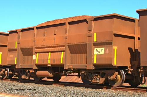 1617 Goninan 110414 0114
Boodarie, loaded BHP Iron Ore Waggon 1617, a Goninan WA replacement 3Cr12 body, has original Comeng build undergear. April 14, 2011.
Keywords: 1617;Goninan-WA;BHP-ore-waggon;