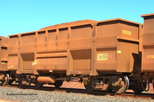 1658 UG 110414 0120
Boodarie, empty BHP Iron Ore Waggon 1658, a United Goninan WA replacement Golynx body built February 2005. Has original Comeng build undergear. April 14, 2011.
Keywords: 1658;United-Goninan-WA;BHP-ore-waggon;