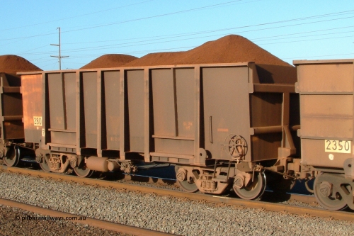 2800 Comeng 041001 165104
Redbank, loaded BHP Iron Ore waggon 2800, a Comeng WA original build from the fifth order in 1971, the Yandi loadout must has had a glitch hence the odd loading profile. October 1, 2004.
Keywords: 2800;Comeng-WA;BHP-ore-waggon;