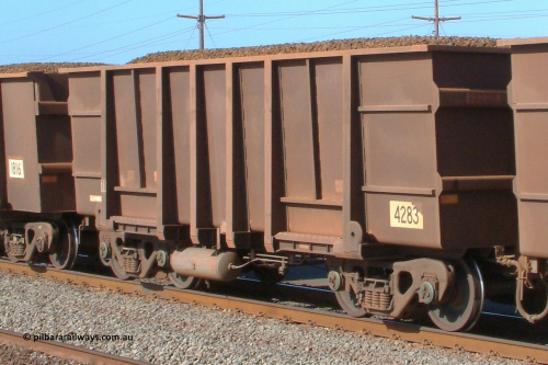 4283 Goninan 041001 153054
Redbank, loaded BHP Iron Ore waggon 4283, a Goninan 3Cr12 type flat floor built in 1997 with asset number 802###. October 1, 2004.
Keywords: 4283;Goninan-WA;BHP-ore-waggon