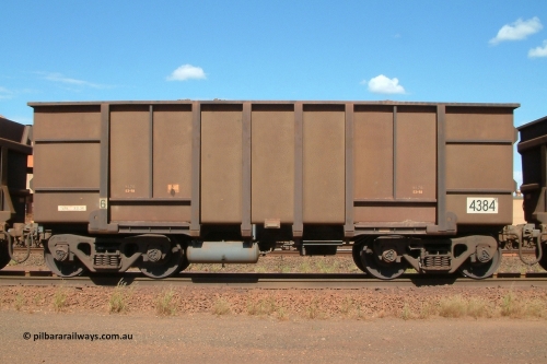 4384 Goninan 040412 143234
Nelson Point, a Goninan built ore waggon 4384, one of 126 such waggons constructed during 1997 out of 3CR12 stainless steel in an effort to eliminate painting and to reduce wear on the waggon body. Note the rounded bottom edge and tapered floor, this design was designated HC7081. 12th April 2004.
Keywords: 4384;Goninan-WA;BHP-ore-waggon;