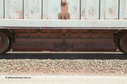 8345 Portec USA 040409 122950
Boodarie, Goldsworthy service bottom discharge Portec USA built ore waggon 345 is one of ten that was purchased second hand in 1992 from Phelps Dodge Copper Mine, believed to be built in 1980s. View of discharge door. 9th April 2004. 8 has been added to number to correctly place the waggon.
Keywords: 345;Portec-USA;BHP-ore-waggon;