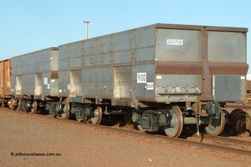 9100 Bradken 041225 064557
Nelson Point Ore Car Repair Shops, brand new Bradken NSW built ore waggon and type leader 9100 asset number 2031702 and 9101 behind it. These waggons are the latest additions to the fleet with 20 on order in total. They are made from the same 5Cr12Ti steel that the Goninan Golynx waggons are made. 9100 has been set up for use as a 'test' waggon with load sensors located all over it. 25th December 2004.
Keywords: 9100;Bradken-NSW;BHP-ore-waggon;