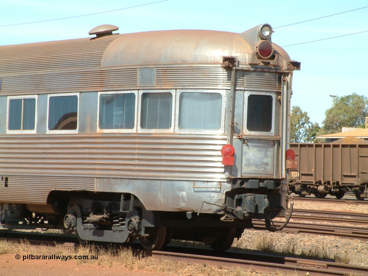 040912 142144
Nelson Point, Silver Star observation coach, 'Sundowner', 3/4 view of rear end, shows lighting arrangement, end of train markers. Originally built by E. G. Budd in 1939 numbered 301 as the Silver Star as a diner-parlour-observation coach on the Chicago, Burlington and Quincy Railroad's General Pershing Zephyr train from the 1930s and 1940s. Donated to Mt Newman Mining Co. by AMAX an original joint venture partner to commemorate the projects first 100 million tonnes of iron ore railed between Mount Whaleback mine and the Port Hedland port.
Keywords: Silver-Star;EG-Budd;Sundowner;General-Pershing-Zephyr;301;