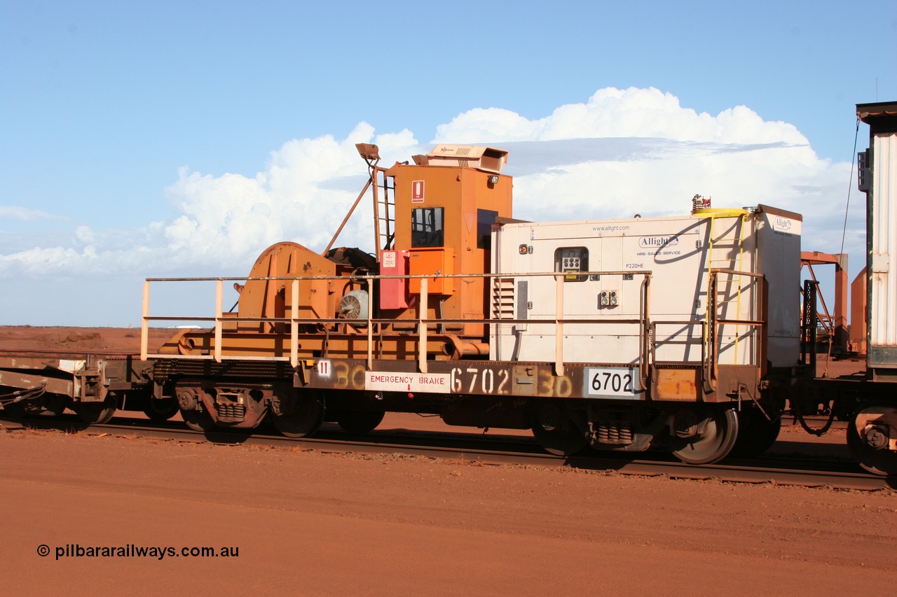050319 0139
Nelson Point, a heavily cut down and modified Magor USA ore waggon, converted to a 50 tonne waggon and designated the winch waggon with generator set to power the winch and the crib car.
Keywords: Magor-USA;Mt-Newman-Mining-WS;BHP-rail-train;
