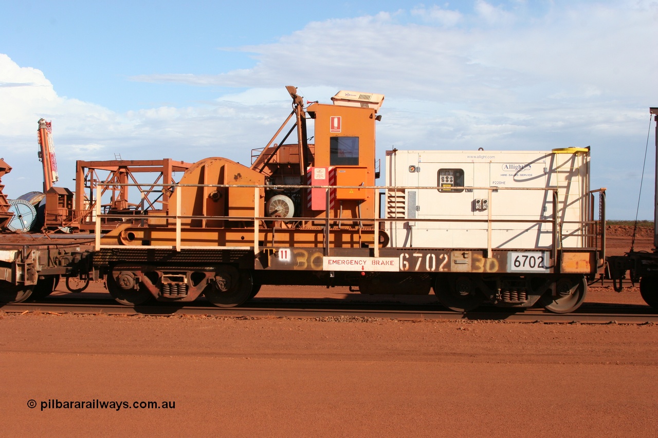 050319 0141
Nelson Point, cut down Magor USA built former Oroville Dam 91 ton ore waggon 665, now used as the crib waggon on the steel train, side view.
Keywords: Magor-USA;BHP-rail-train;